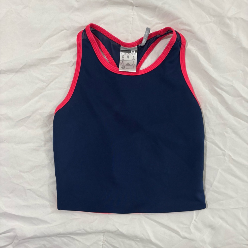 Adidas sports top with transparency on the back